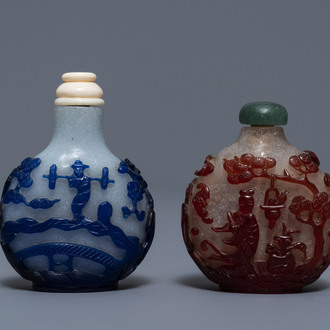 Two Chinese overlay red and blue snowflake glass snuff bottles, 19th C.