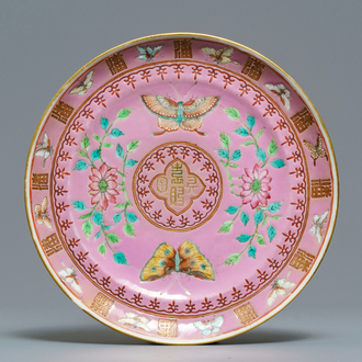 A Chinese pink-ground famille rose Pan family Straits market plate, Guangxu mark, 19th C.