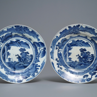 A pair of Japanese blue and white dishes with mountainous landscapes, Arita, Edo, 17/18th C.
