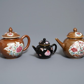 Three Chinese famille rose capucin- and black-ground teapots, Yongzheng/Qianlong