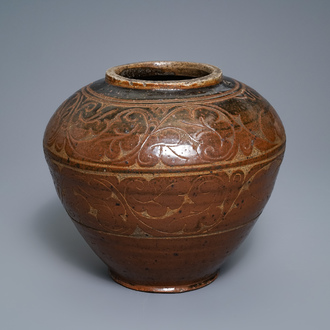 A Chinese brown-glazed cizhou jar with incised design, Yuan