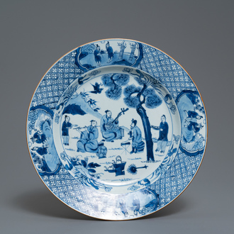 A Chinese blue and white dish with musicians in a garden, Kangxi