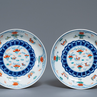 A pair of Chinese doucai 'ducks in a lotus pond' plates, four-character mark, Republic