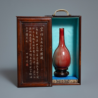 A Chinese monochrome sang-de-boeuf bottle vase in wooden presentation box, Republic