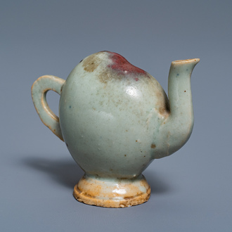 A Chinese miniature peach-shaped cadogan teapot with junyao glaze, Kangxi/Qianlong