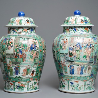 A pair of large Chinese famille verte vases and covers, Kangxi