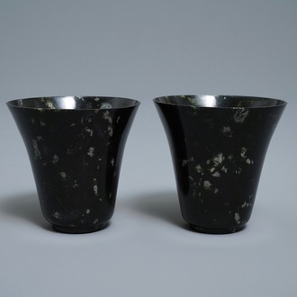 A pair of Chinese dark green jade wine cups, Qing