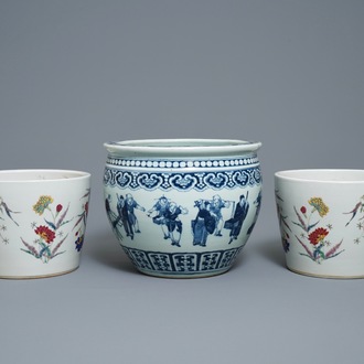 A pair of Chinese famille rose jardinières and a blue and white example, 19th C.
