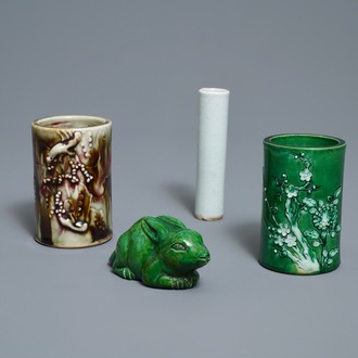 Two Chinese monochrome relief-decorated brush pots, an incense tube and a rabbit, 18/19th C.