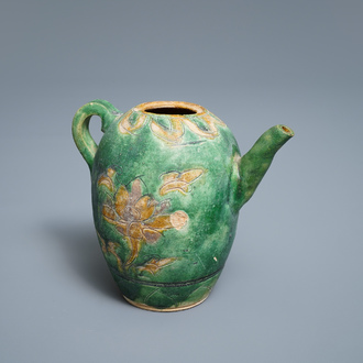 A Chinese sancai-glazed ewer with incised design, Liao (916-1125)