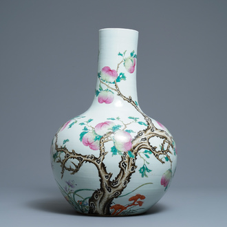 A Chinese famille rose 'peaches' vase, Qianlong mark, 19th C.