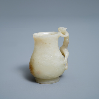 A Chinese celadon russet jade chilong-handled jug, Qing