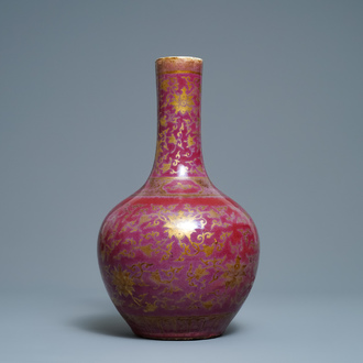 A Chinese gilt-decorated flambé-glazed bottle vase, 19th C.