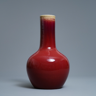 A Chinese monochrome sang-de-boeuf bottle vase, 19th C.