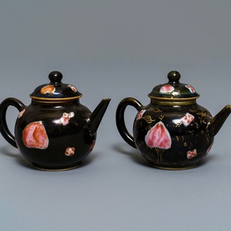 A pair of Chinese famille rose black-ground teapots and covers, Yongzheng/Qianlong