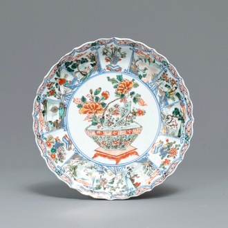 A Chinese famille verte lobed plate with a flowery jardinière, Kangxi