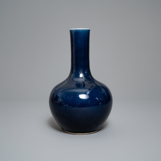 A Chinese monochrome 'sacrifical blue' bottle vase, Qianlong mark and of the period