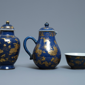 A Chinese gilt-decorated powder blue cream jug, a tea caddy and a tea bowl with roosters, Yongzheng