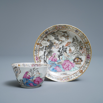 A Chinese famille rose 'amorous couple' cup and saucer, Qianlong