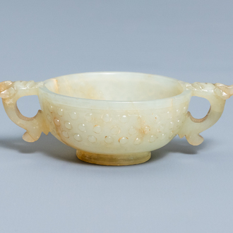 A Chinese pale celadon and russet jade two-handled bowl, prob. Ming