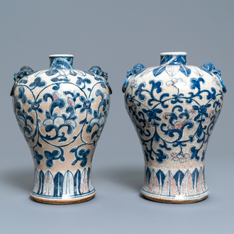 A pair of Chinese blue, white and copper-red meiping crackle-glazed vases, 19th C.
