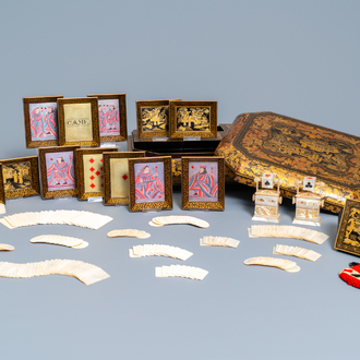 An extensive Chinese Canton export gilt and lacquer gaming box with mother-of-pearl accessories, 19th C.