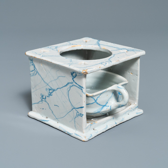 A blue and white 'faux-marbre' stove with brazier, Harlingen, 1st quarter 19th C.