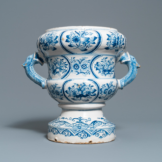 A large blue and white two-handled urn with floral design, Makkum, 18th C.