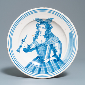 A blue and white dish with an allegorical depiction of the hearing, Makkum, 1st half 18th C.