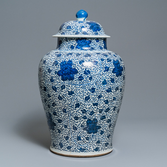 A large Chinese blue and white 'peony scrolls' vase and cover, Kangxi