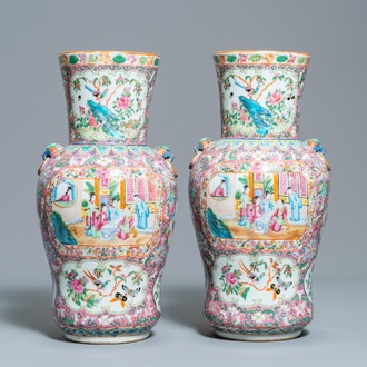 A pair of Chinese Canton famille rose pink-ground vases, 19th C.