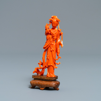 A Chinese carved coral figure of a lady with lingzhi, 19/20th C.