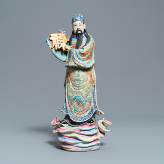 A Chinese famille rose figure of an immortal, 19/20th C.