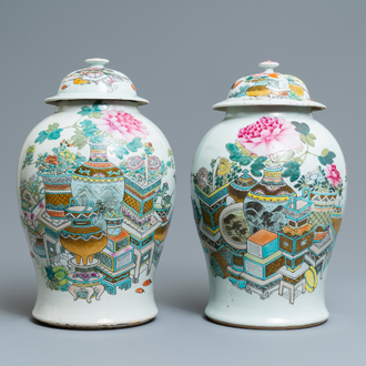 Two Chinese qianjiang cai vases and covers with antiquities, 19th C.