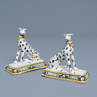 A pair of polychrome Brussels faience models of greyhounds, ca. 1800