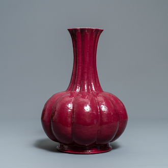 A Chinese monochrome ruby red vase, Qianlong mark, 19th C.