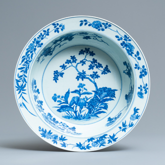 A Chinese blue and white basin with floral design, 19th C.