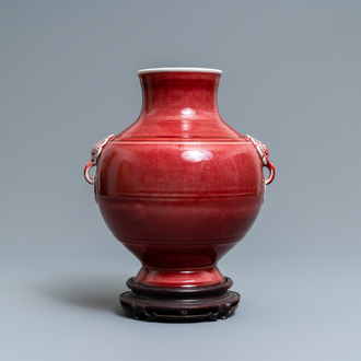 A Chinese monochrome sang-de-boeuf 'hu' vase, Qianlong mark, 19/20th C.