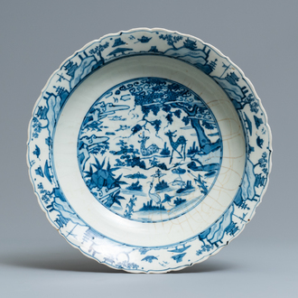 A Chinese blue and white Swatow dish with deer in a landscape, Ming