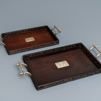 Two Chinese wooden trays with engraved silver plaques and bamboo-shaped handles, 19th C.