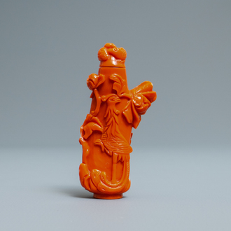 A Chinese carved red coral snuff bottle with birds and flowers, 19/20th C.