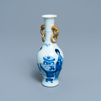 A Chinese blue and white vase with gilt elephant-head handles, Kangxi