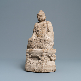 Un groupe en pierre sculptée figurant Bouddha sur un trône, Wei ou après