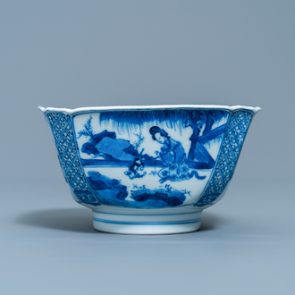 A Chinese blue and white bowl with a lady with cat, Kangxi mark and of the period