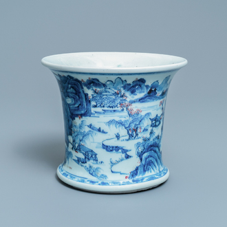 A fine Chinese blue, white and copper red 'Master of the Rocks' brush pot, Kangxi