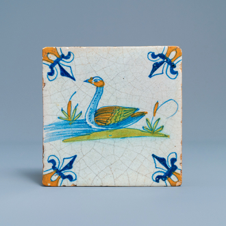 A polychrome Dutch Delft tile with a swan, 1st half 17th C.