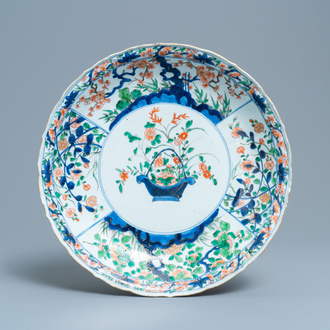 A Chinese famille verte dish with a flower basket, Kangxi