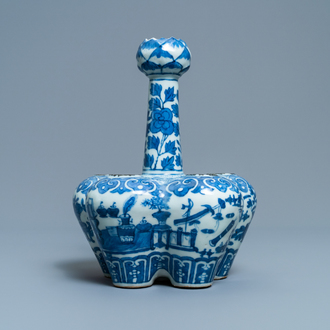 A Chinese blue and white tulip vase with antiquities, 19th C