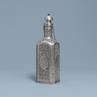 A reticulated Qajar silver flask with glass insert, Iran, 19th C.