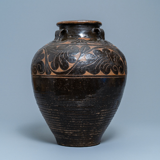 A large Chinese Cizhou vase with engraved floral design, Yuan/Ming